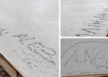 Inexplicable: estaban asfaltando una calle y unos bobos la escribieron